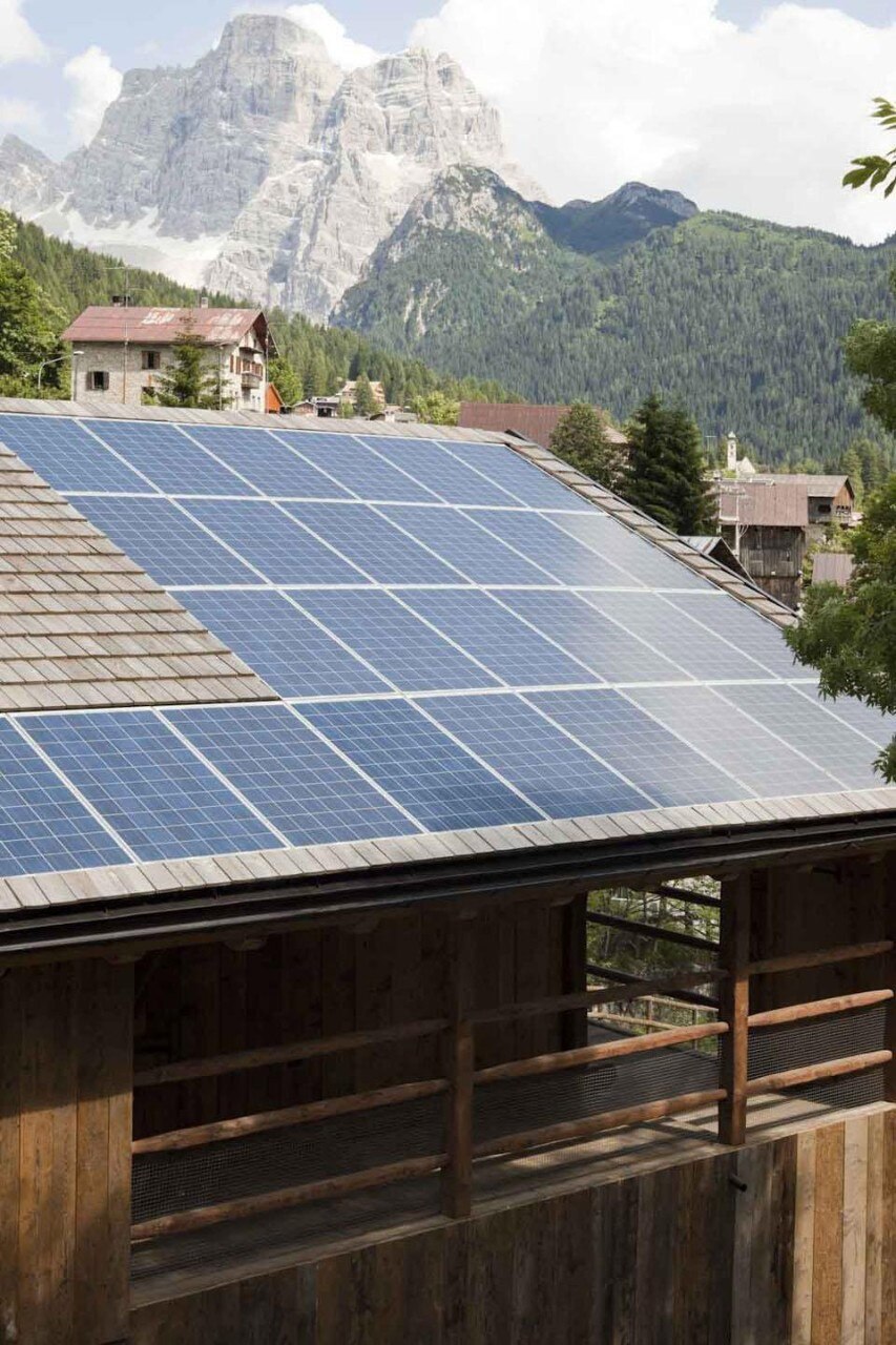 The roof with tiles and photovoltaic panels The roof with tiles and photovoltaic panels