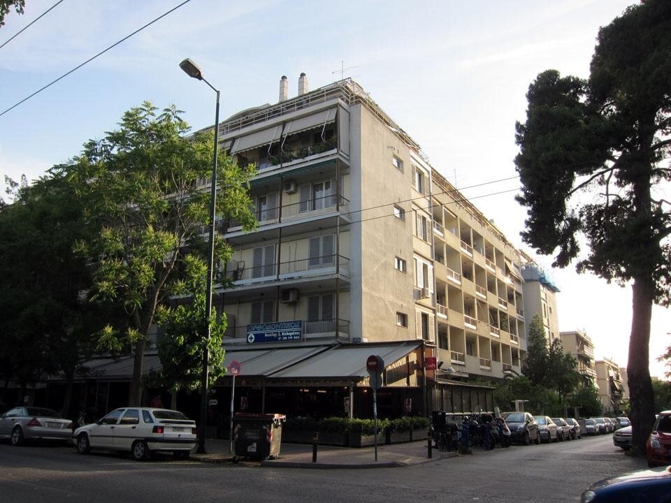 A recent image of Chara, the largest housing block in downtown Athens. It is also one of the few <i>polykatoikies</i> with a habitable courtyard, a little garden and a playground. A recent image of Chara, the largest housing block in downtown Athens. It is also one of the few <i>polykatoikies</i> with a habitable courtyard, a little garden and a playground.
