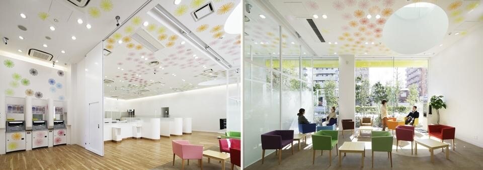 ATMs, teller windows, consultation booths and an open space laid out with chairs in 14 different colors are located on the first floor. ATMs, teller windows, consultation booths and an open space laid out with chairs in 14 different colors are located on the first floor.