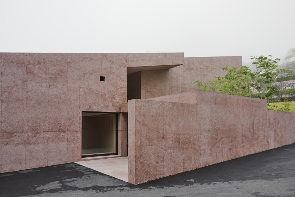 Japan. David Chipperfield completes a contemplative building in red