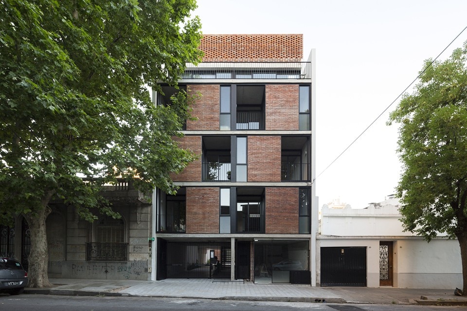 Prefabricated modules form brick facade of Buenos Aires apartment block