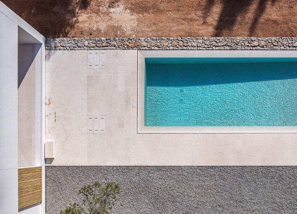 Five open and interconnected volumes define Ca l’Amo house in Ibiza