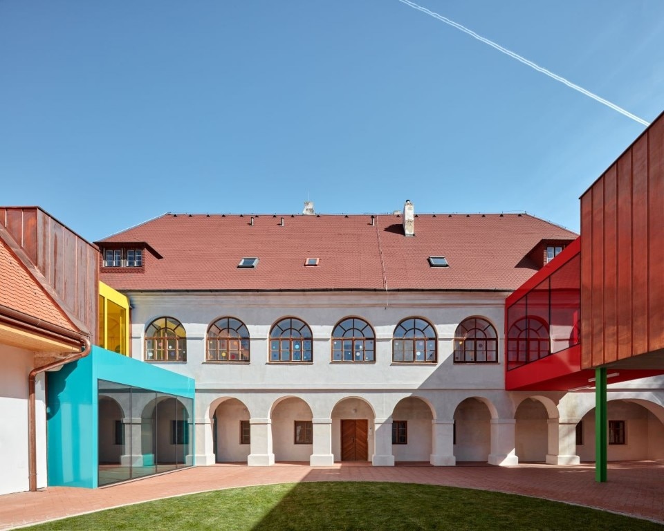 Colourful boxes connect the buildings of a school in the Czech Republic