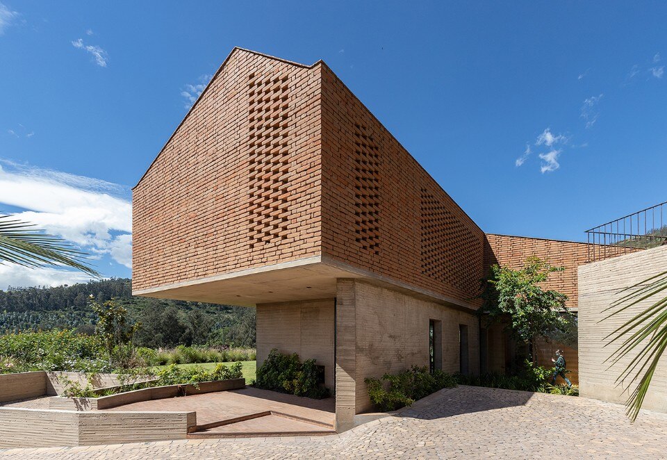 A brick house in Quito blends with the landscape