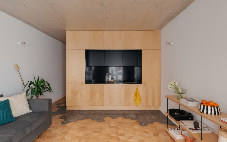 The material palette is the key to understanding this residential building in Lisbon