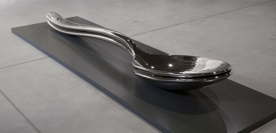 Subodh Gupta, <i>Spooning,</i> 2009. Stainless steel, 2 parts,
33.9 x 274.9 x 52 cm. © Subodh Gupta, courtesy the artist and Hauser & Wirth.
© Palazzo Grassi. Subodh Gupta, <i>Spooning,</i> 2009. Stainless steel, 2 parts,
33.9 x 274.9 x 52 cm. © Subodh Gupta, courtesy the artist and Hauser & Wirth.
© Palazzo Grassi.