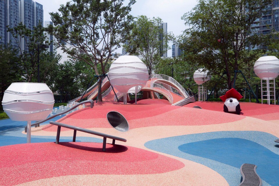 Cavernous spaces and bright colors for a playground born above a carpark
